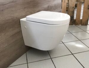 réparer réservoir toilette encastré