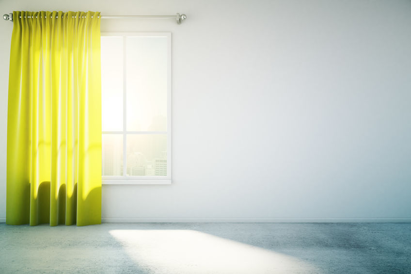 Blank white wall yellow curtain